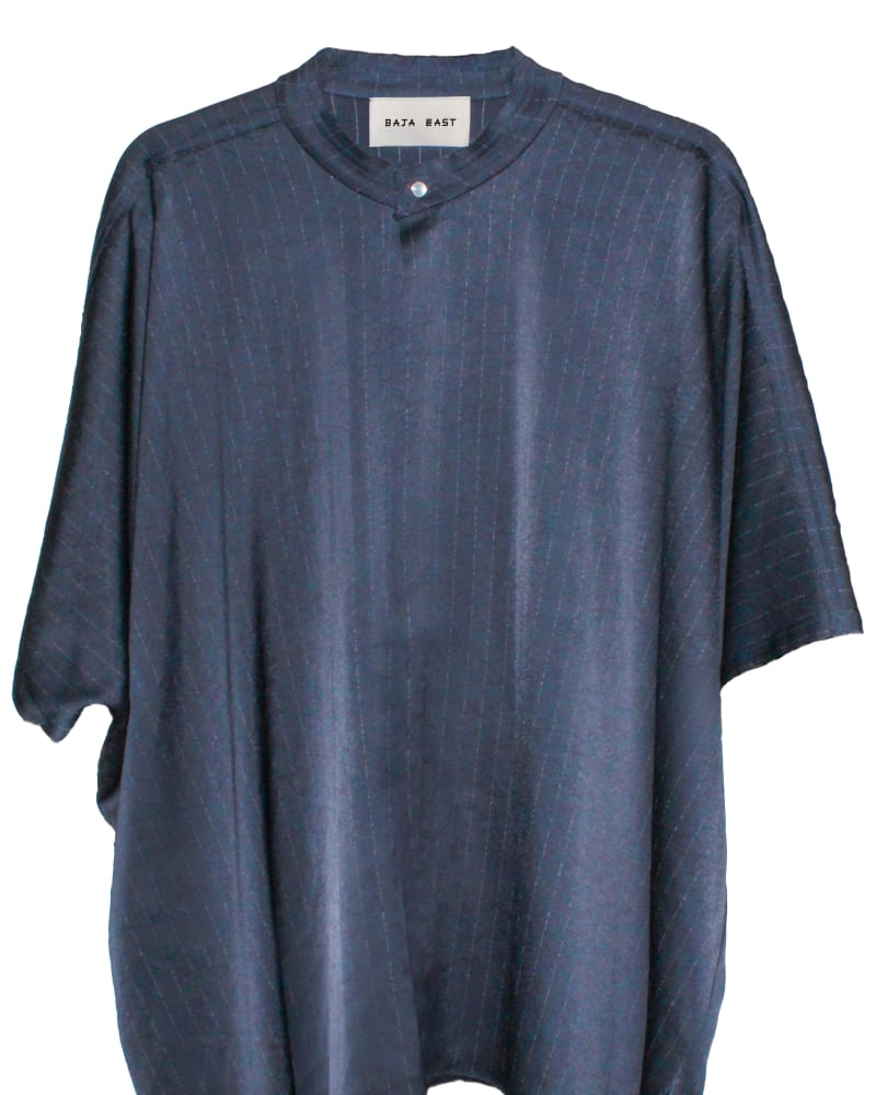 Front of a size 5 Kaftan Shirt In Navy Pinstripe Crepe in Navy by Baja East. | dia_product_style_image_id:304619